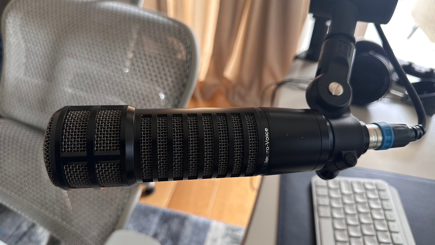 A desk microphone used while building and testing HoldType